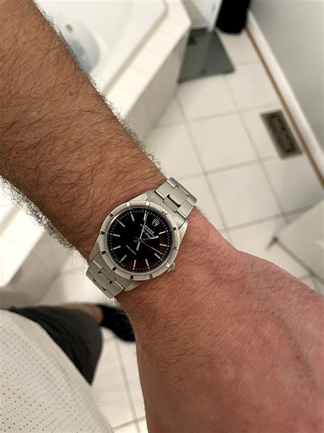 rolex 34mm on wrist.